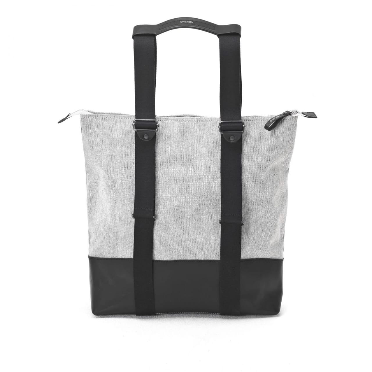 Front of zip tote bag with white canvas, black canvas straps and handle, and black zipper pulls.
